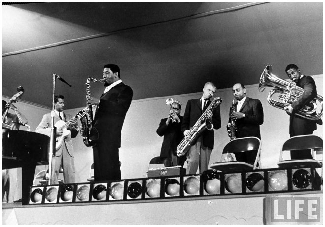 sonny-rollins-5r-dizzy-gillespie-4r-and-gerry-mulligan-3r-ben-webster-2r-at-the-monterey-jazz-festival-by-nat-farbman-1958.jpeg