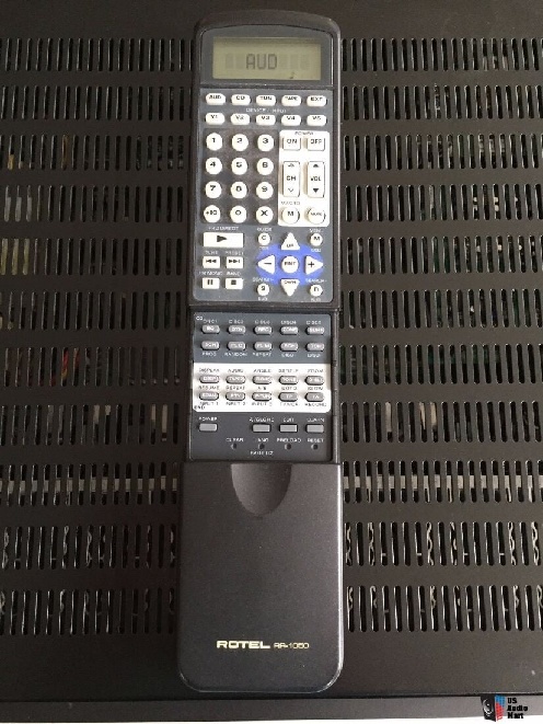 1600284-6e339b90-rotel-rsx1055-surround-receiver-amp-rotel-rr1050-learning-remote.jpg